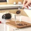 Battery Operated Salt And Pepper Grinder Set with LED Light, Automatic Electric Gravity Salt And Pepper Shakers Set, Each 6 AAA Batteries Needed, Adjustable Roughness, 2 Pack (Black)